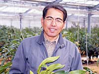 写真 にえなみ亜熱帯果樹組合 組合長 さかいかつゆきさん
